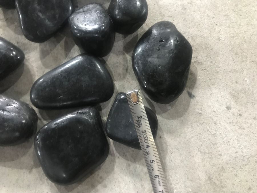black polished river stones
